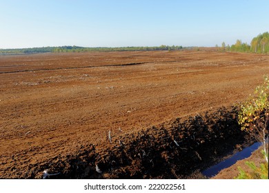 Industrial Milled Peat Production In Saara Bog, Estonia.