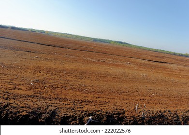 Industrial Milled Peat Production In Saara Bog, Estonia.