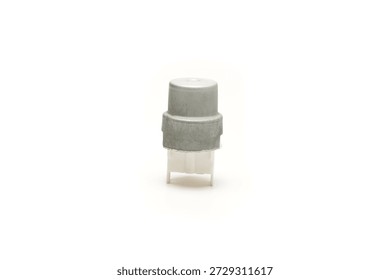 Industrial momentary push button switch isolated on white background, electronic component used in control panels and electrical devices.