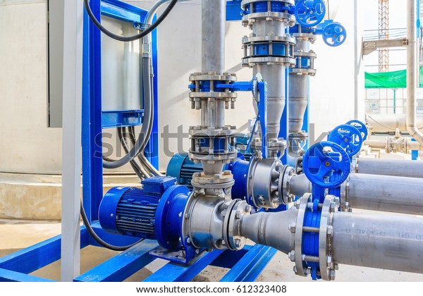 Industrial motor water\
pump and water pipes
