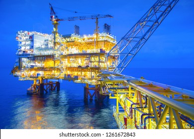 Industrial Offshore Oil And Gas,Oil Rig Platform At Night.