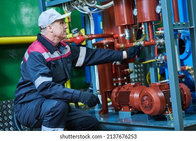 Industrial Oil Service And Mantenance. Industrial Worker Operates Oil Purification Machine