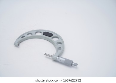 Industrial outside micrometer in white background