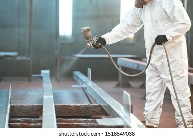 Industrial Painter In Chamber Painting Metal Detail