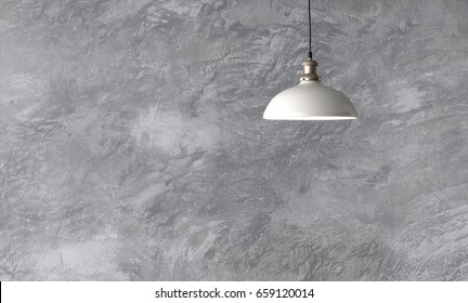 Industrial pendant lamps against rough wall with gray cement plaster. Edison light bulbs in loft style. - Powered by Shutterstock