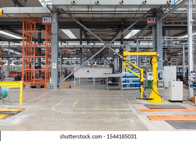 Industrial Picking Robot At Work. Interior Of Plant Warehouse: Industrial Picking Robot At Work, No People