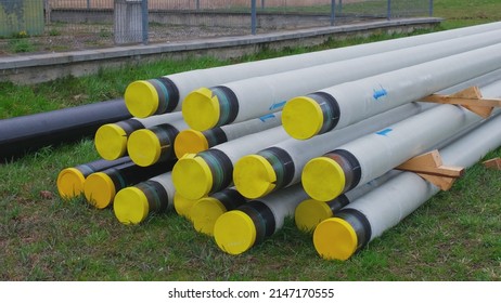 Industrial Pipes Used For Natural Gas Distribution System Stacked At Pipeline Construction Site