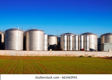 industrial plant with store tanks near field