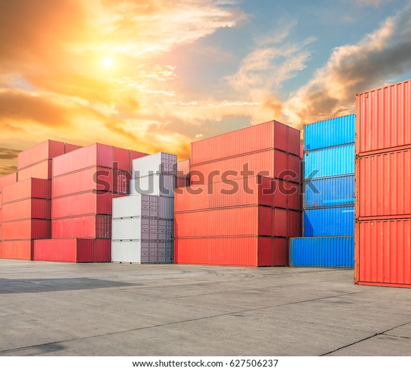 Industrial port\
container terminal at\
sunset