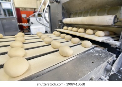 Industrial Production Of Bakery Products On An Assembly Line - Technology And Machinery In The Food Factory 