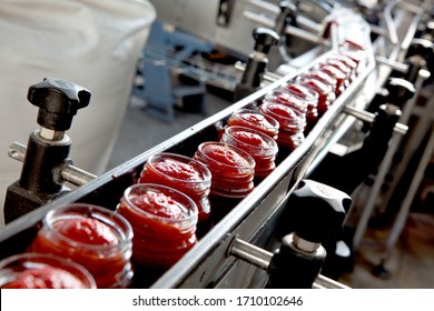 industrial production of tomatoes and tomato paste - Shutterstock ID 1710102646