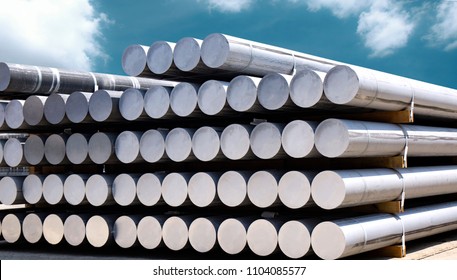 Industrial raw materials, Heap of aluminium bar in aluminum profiles factory.
 - Shutterstock ID 1104085577