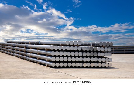 industrial raw materials, heap of aluminium bar in aluminium profiles factory.