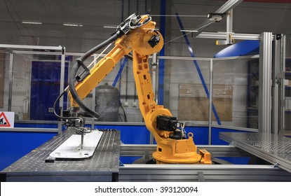 Industrial Robot in manufacturing - Shutterstock ID 393120094