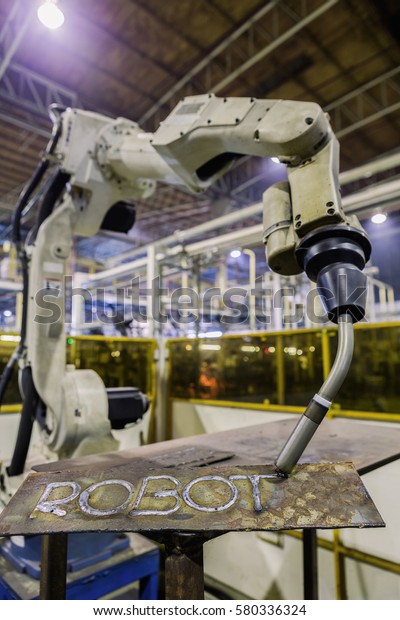Industrial
robot is test welding in robot training
arear