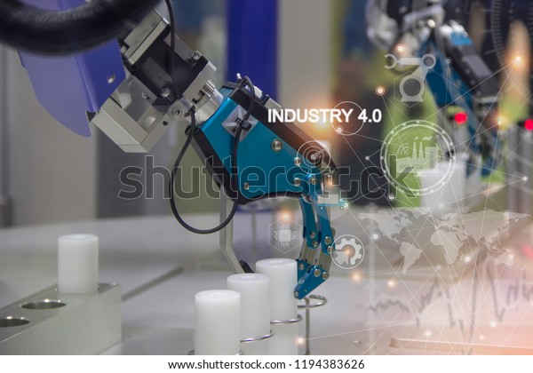 Industrial robot working in factory,Industry 4.0\
Robot concept .\
