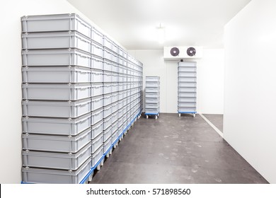 An Industrial Room Refrigerator With Two Fans