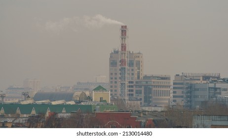 Industrial Silhouettes Of Moscow. Business  Buildings And Chimney Of The Heat Station. No People. High Angle View