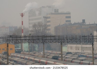 Industrial Silhouettes Of Moscow. Business  Buildings, Train Depot And Chimney Of The Heat Station. No People. High Angle View