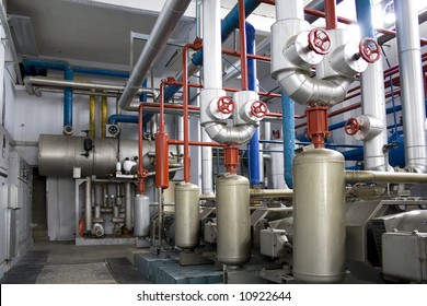 Industrial Size Generators In A Factory Machinery Room