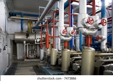 Industrial Size Generators In A Factory Machinery Room