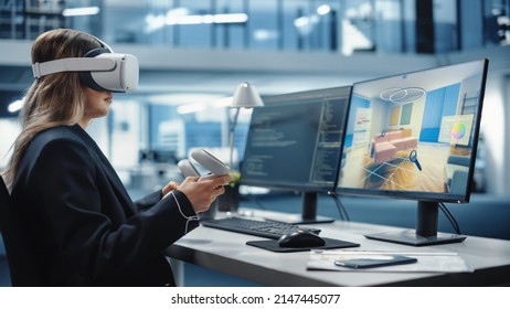 Industrial Software Developer Writing Code and Testing 3D Interior Design Interface. Engineer Editing and Moving Furniture while Wearing Virtual Reality Headset and Using Controllers. - Powered by Shutterstock