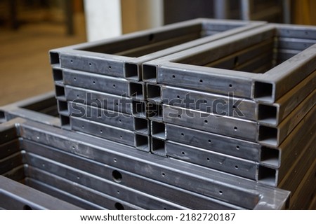 Industrial steel and metal works welded frame, welding iron and steel for construction and building. Solid cold hard metal frames and framework for structures and foundations for skyscraper engineers.