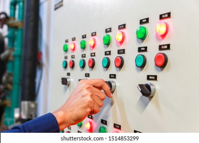 Industrial Technician Check Voltage Or Current Status In Control Panel Of Power Plant.