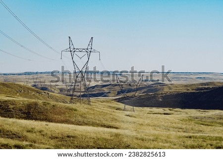 Industrial transmitter towers  in the countryside of the American Midwest, in Wyoming, during autumn