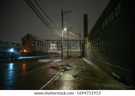 Industrial urban street city night scenery in Chicago with snow