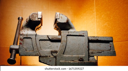 Industrial Vice Tool, Orange Background