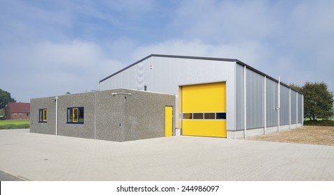 industrial warehouse with yellow roller door