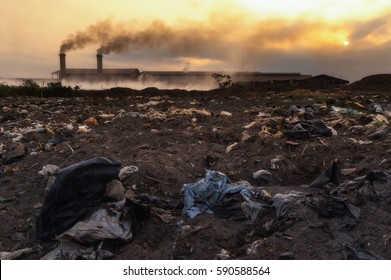 Industrial Waste And Air Pollution With Black Smoke From Chimneys. 