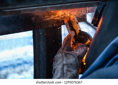 Industrial welder welding fabricated construction in factory, Welding process by Shielded Metal Arc Welding (SMAW) or Stick Welding. 6G, PE