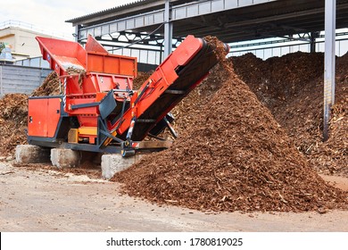 Industrial Wood Shredder Producing Wood Chips From Bark