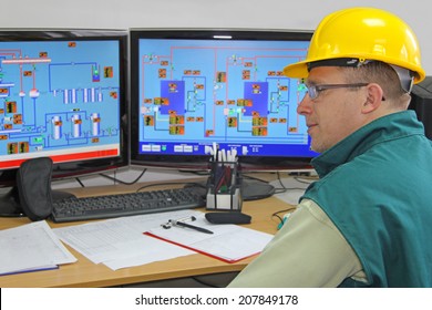 Industrial Worker In Control Room