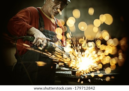 Similar – Image, Stock Photo The worker cuts the parquet on a circular saw