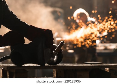 Industrial Worker At The Factory Welding Closeup