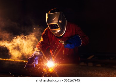 Industrial Worker at the factory welding closeup - Shutterstock ID 366167945