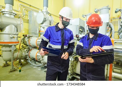 Industrial Worker Portrait In Mask At Power Energy Supply Factory