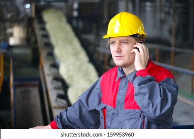 Industrial Worker Talking On Cell Phone