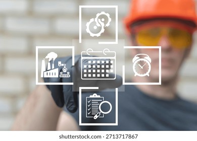 Industrial worker using virtual touch screen presses the icon CALENDAR. Industry planning, production scheduling, time management, organization concept. Organizing manufacturing work tasks.
