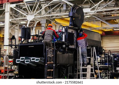 Industrial Workers Assembles Agricultural Machinery In Workshop