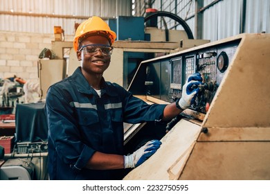 Industrial workers cooperating while doing quality control of manufactured products in a factory.