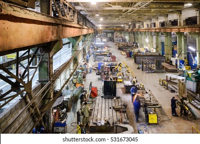 Industrial, workshop for production of handling removable devices. View from the ceiling.