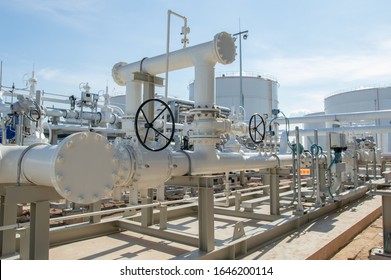 Industrial zone:Pipeline Skid Measuring Station for refinery.Oil metering station and pipeline at refinery plant.Oil and gas processing plant with pipe line valves.Outdoor pipelines in the refinery.