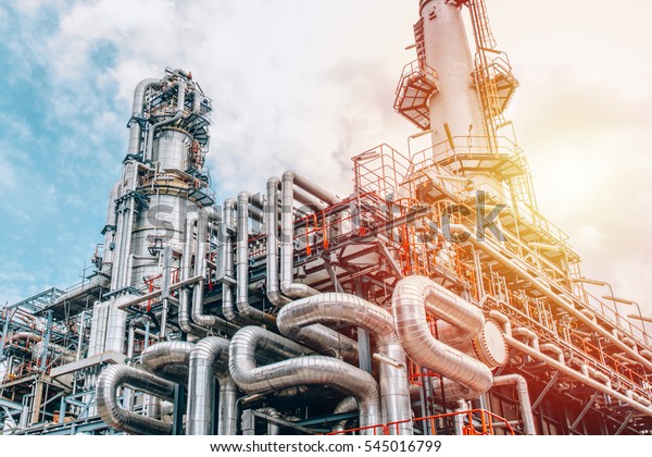 Industrial zone,The equipment of oil
refining,Close-up of industrial pipelines of an oil-refinery
plant,Detail of oil pipeline with valves in large oil
refinery.