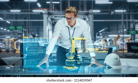 Industry 4.0 High-Tech Factory: Robotics Engineer Working On Robot Arm Design, Using Augmented Reality Hologram To Analyze Conceptual 3D Model. Futuristic Engineering With Digital Technology