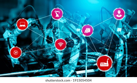 Industry 4.0 Technology Concept - Smart Factory For Fourth Industrial Revolution With Icon Graphic Showing Automation System By Using Robots And Automated Machinery Controlled Via Internet Network .