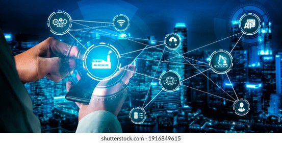 Industry 4.0 technology concept - Smart factory for fourth industrial revolution with icon graphic showing automation system by using robots and automated machinery controlled via internet network .